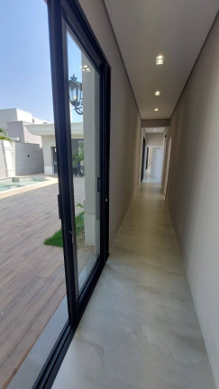 Imagem Casa com 4 Quartos à Venda, 693 m² em Condomínio Florais Itália - Cuiabá