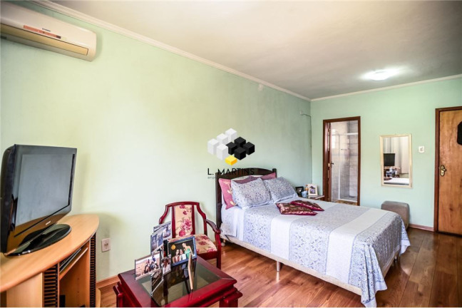 Imagem Casa com 2 Quartos à Venda, 149 m² em Passo Da Areia - Porto Alegre Imagem Casa com 2 Quartos à Venda, 149 m² em Passo Da Areia - Porto Alegre
