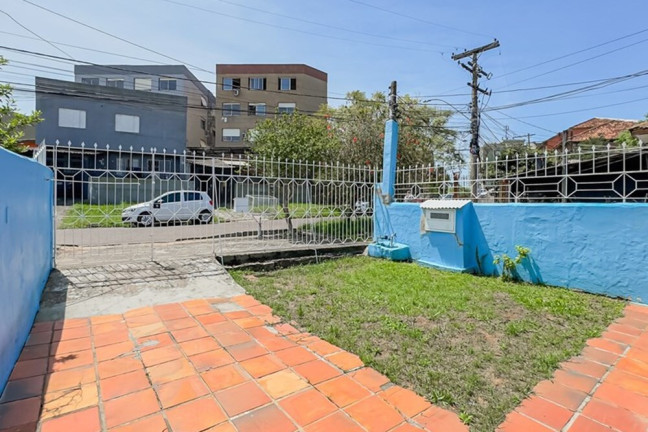 Imagem Casa com 5 Quartos à Venda, 128 m² em Vila Jardim - Porto Alegre