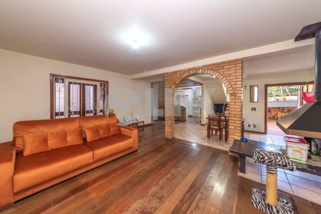 Imagem Casa com 3 Quartos à Venda, 262 m² em Auxiliadora - Porto Alegre Imagem Casa com 3 Quartos à Venda, 262 m² em Auxiliadora - Porto Alegre
