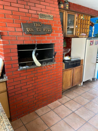 Imagem Casa com 4 Quartos à Venda, 480 m² em Santo Antônio - Porto Alegre