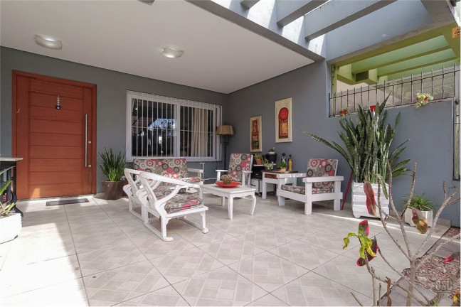 Imagem Casa com 3 Quartos à Venda, em Hípica - Porto Alegre Imagem Casa com 3 Quartos à Venda, em Hípica - Porto Alegre