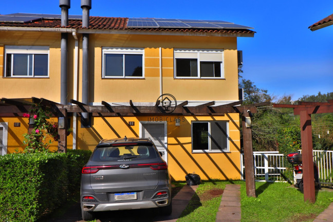Imagem Casa de Condomínio com 3 Quartos à Venda, 113 m² em Mário Quintana - Porto Alegre