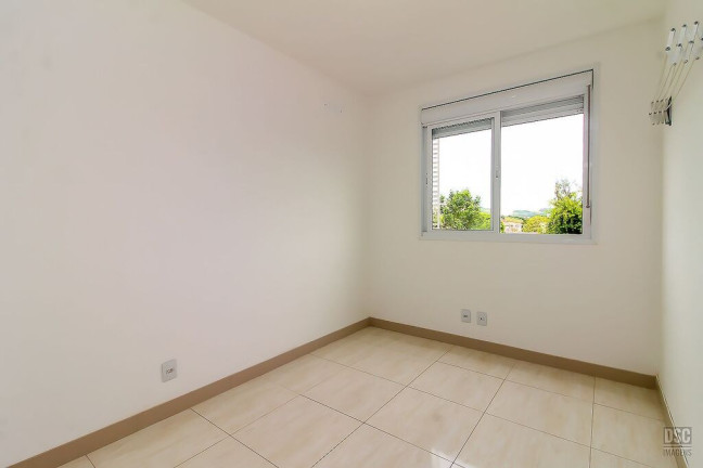 Imagem Apartamento com 2 Quartos à Venda, 58 m² em Vila Nova - Porto Alegre