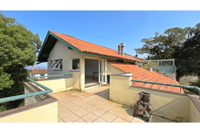 Imagem Casa de Condomínio com 3 Quartos à Venda, 254 m² em Ipanema - Porto Alegre