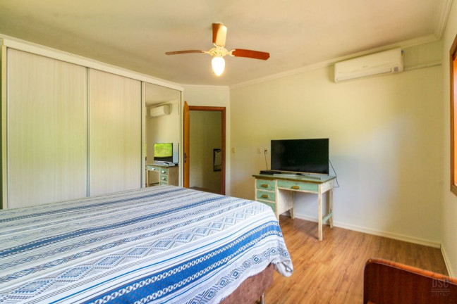 Imagem Casa com 3 Quartos à Venda, 197 m² em Hípica - Porto Alegre