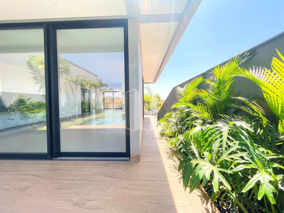 Imagem Casa de Condomínio com 4 Quartos à Venda, 375 m² em Jardins Itália - Goiânia