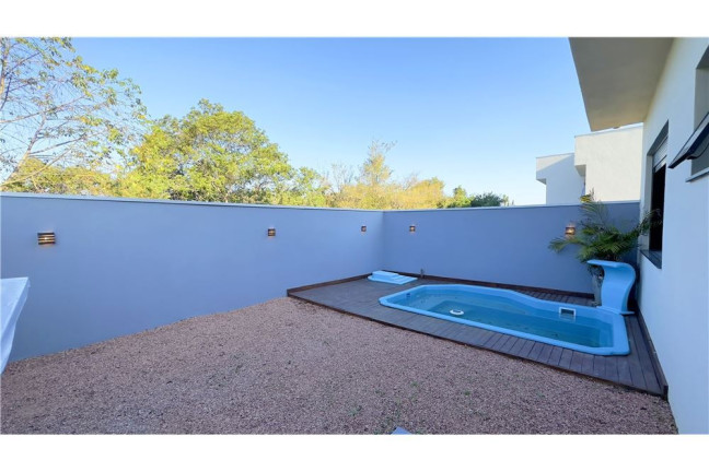 Imagem Casa com 3 Quartos à Venda, em Loteamento Jardim Timbaúva - Gravataí Imagem Casa com 3 Quartos à Venda, em Loteamento Jardim Timbaúva - Gravataí