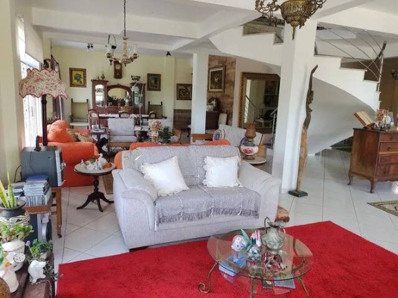 Imagem Casa com 4 Quartos à Venda, 329 m² em Vila Nova - Porto Alegre