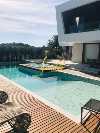 Imagem Sobrado com 6 Quartos à Venda, 1.195 m² em Zona Nova - Capão Da Canoa