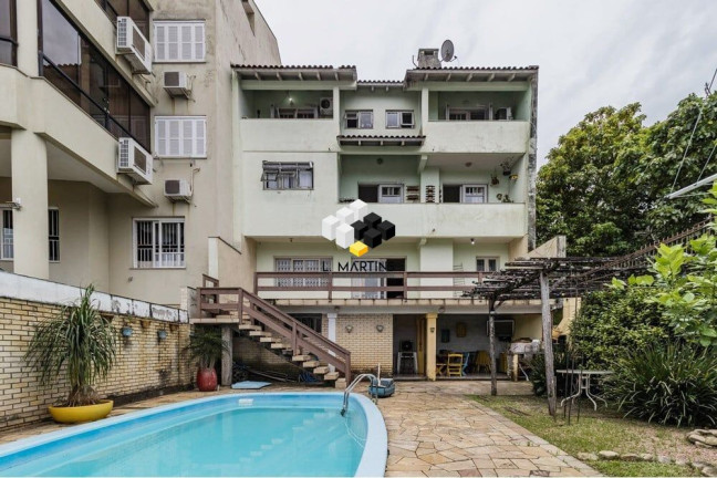 Imagem Casa com 3 Quartos à Venda, 464 m² em Santo Antônio - Porto Alegre Imagem Casa com 3 Quartos à Venda, 464 m² em Santo Antônio - Porto Alegre