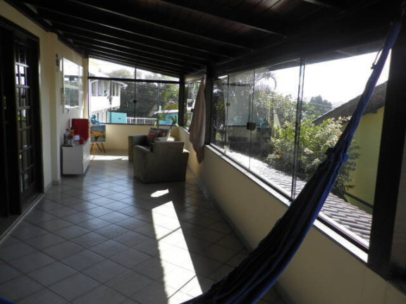 Imagem Casa com 4 Quartos à Venda, 256 m² em Santinho - Florianópolis