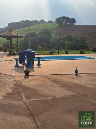 Imagem Chácara com 4 Quartos à Venda, 230 m²