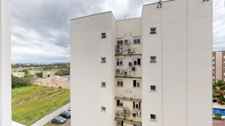 Imagem Imóvel com 2 Quartos à Venda, 58 m² em Vila Nova - Porto Alegre Imagem Imóvel com 2 Quartos à Venda, 58 m² em Vila Nova - Porto Alegre