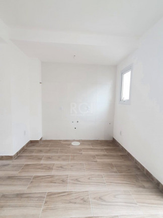 Imagem Casa de Condomínio com 2 Quartos à Venda, 64 m² em Vila Nova - Porto Alegre