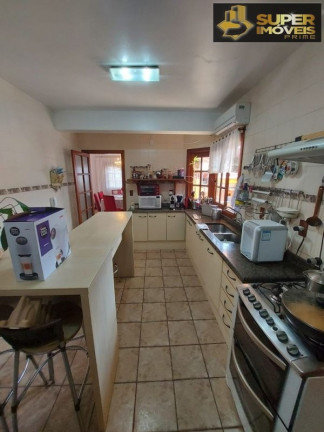 Imagem Casa com 4 Quartos à Venda, 360 m² em Centro - Pelotas Imagem Casa com 4 Quartos à Venda, 360 m² em Centro - Pelotas