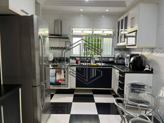 Imagem Casa com 3 Quartos à Venda, 150 m² em Macuco - Santos