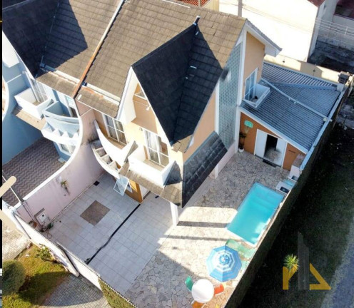 Imagem Casa com 4 Quartos à Venda, 191 m² em Bairro Alto - Curitiba
