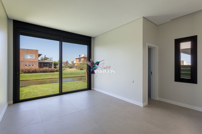 Imagem Casa de Condomínio com 3 Quartos à Venda, 256 m² em Centenário - Torres