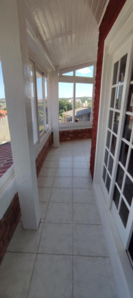 Imagem Casa com 3 Quartos à Venda, 310 m² em Vila Nova - Porto Alegre