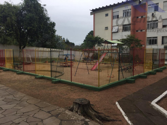 Imagem Imóvel com 1 Quarto à Venda, 41 m² em Vila Nova - Porto Alegre Imagem Imóvel com 1 Quarto à Venda, 41 m² em Vila Nova - Porto Alegre