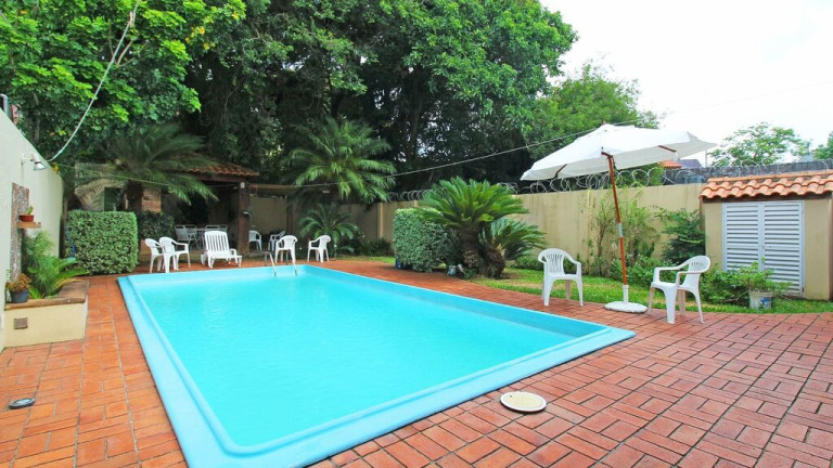 Imagem Casa com 4 Quartos à Venda, 243 m² em Partenon - Porto Alegre