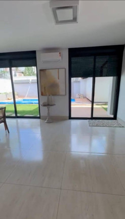 Imagem Casa de Condomínio com 4 Quartos à Venda, 291 m² em Jardins Madri - Goiânia