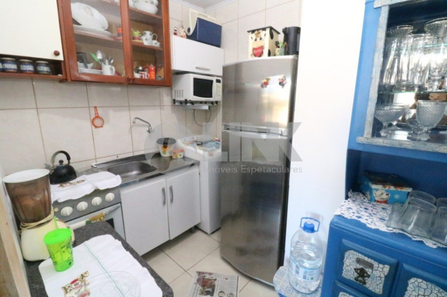 Imagem Apartamento com 1 Quarto à Venda, 27 m² em Santo Antônio - Porto Alegre Imagem Apartamento com 1 Quarto à Venda, 27 m² em Santo Antônio - Porto Alegre