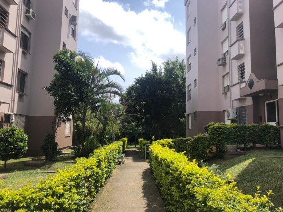 Imagem Apartamento com 2 Quartos à Venda, 63 m² em Protasio - Porto Alegre