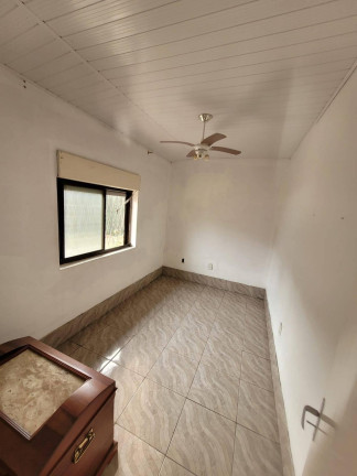 Imagem Casa com 4 Quartos à Venda, 418 m² em Jari - Viamão