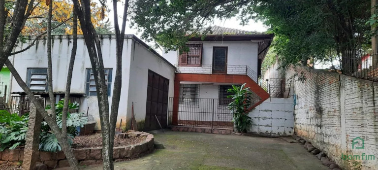 Imagem Casa com 3 Quartos à Venda, 300 m² em Vila Nova - Porto Alegre