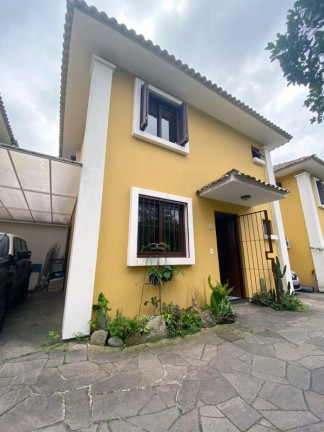 Imagem Casa com 3 Quartos à Venda, 102 m² em Partenon - Porto Alegre