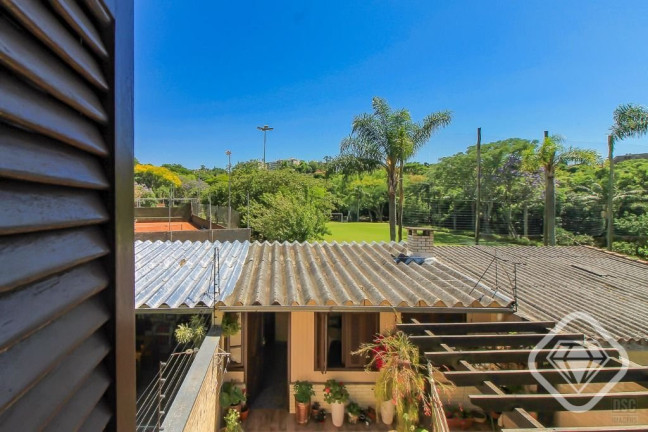 Imagem Casa com 3 Quartos à Venda, 198 m² em Cavalhada - Porto Alegre