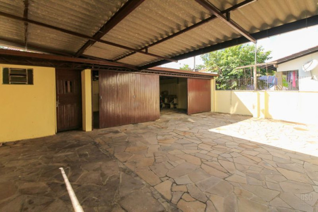 Imagem Casa com 7 Quartos à Venda, 330 m² em Nonoai - Porto Alegre