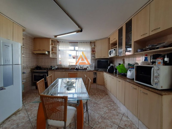 Imagem Casa com 4 Quartos à Venda, 200 m²