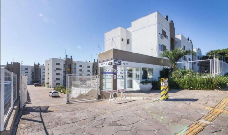 Imagem Imóvel com 2 Quartos à Venda, 50 m² em Vila Nova - Porto Alegre Imagem Imóvel com 2 Quartos à Venda, 50 m² em Vila Nova - Porto Alegre