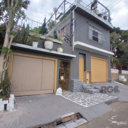 Imagem Casa com 8 Quartos à Venda, 300 m² em Cavalhada - Porto Alegre