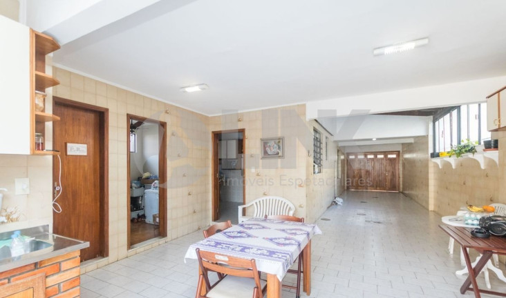 Imagem Sobrado com 3 Quartos à Venda, 316 m² em Jardim Lindóia - Porto Alegre