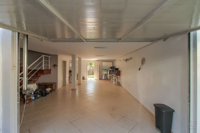 Imagem Casa de Condomínio com 3 Quartos à Venda, 205 m² em Vila Nova - Porto Alegre