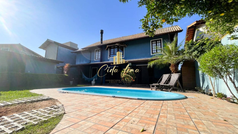 Imagem Casa com 3 Quartos à Venda, 228 m² em Rio Tavares - Florianópolis
