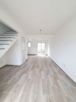 Imagem Casa de Condomínio com 2 Quartos à Venda, 64 m² em Vila Nova - Porto Alegre