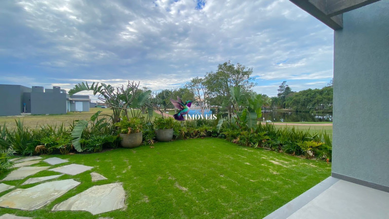 Imagem Casa de Condomínio com 4 Quartos à Venda, 324 m² em Centro - Capão Da Canoa
