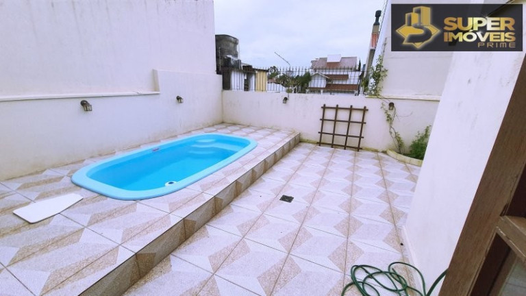 Imagem Casa com 3 Quartos à Venda, 360 m² em Centro - Pelotas