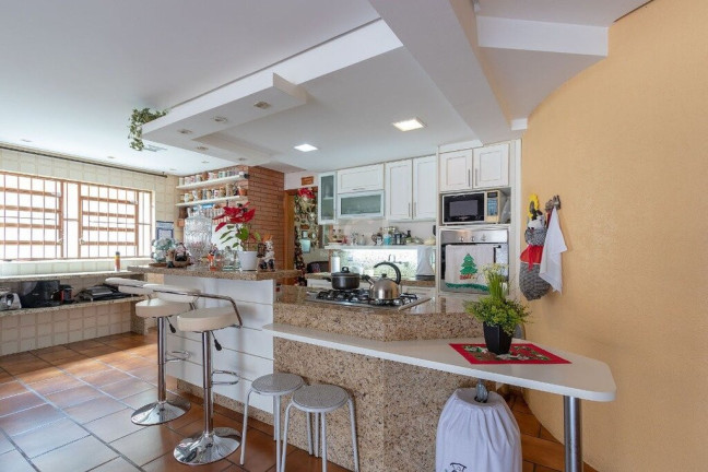 Imagem Casa com 4 Quartos à Venda, 725 m² em Vila Assunção - Porto Alegre