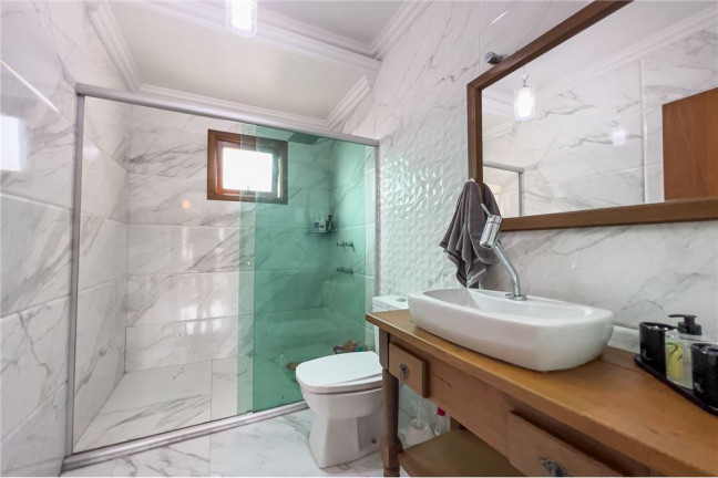 Imagem Casa de Condomínio com 3 Quartos à Venda, 183 m² em Ipanema - Porto Alegre