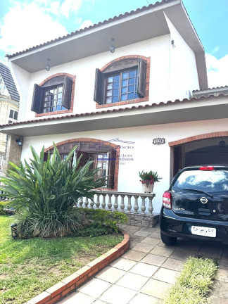 Imagem Casa com 3 Quartos à Venda, 244 m² em Cavalhada - Porto Alegre