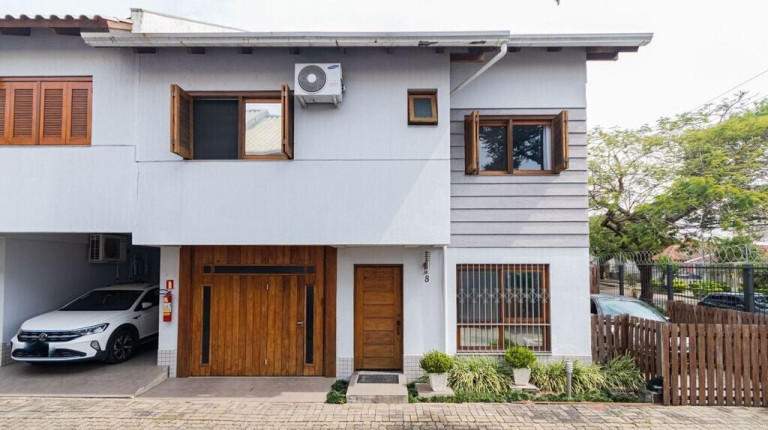 Imagem Casa de Condomínio com 3 Quartos à Venda, 168 m² em Santo Antônio - Porto Alegre