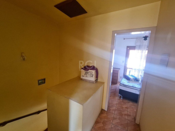 Imagem Casa de Condomínio com 2 Quartos à Venda, 72 m² em Hípica - Porto Alegre