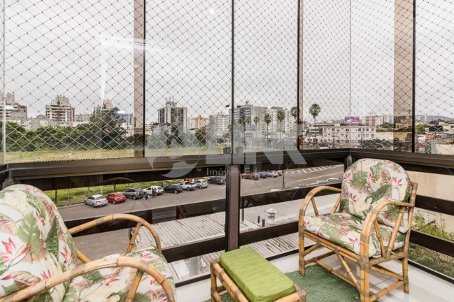 Imagem Imóvel com 3 Quartos à Venda, 211 m² em Jardim Lindóia - Porto Alegre