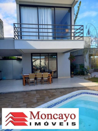 Imagem Sobrado com 3 Quartos à Venda, 381 m² em Poiares - Caraguatatuba